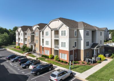 A large, three-story apartment building in McDowell Creek Court.