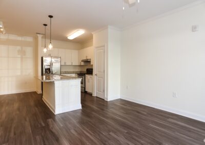 An open concept kitchen with room for a dining and living room space.