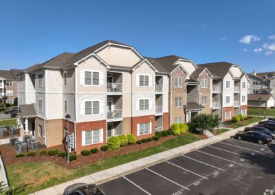 A large three-story apartment building in McDowell Creek Court.
